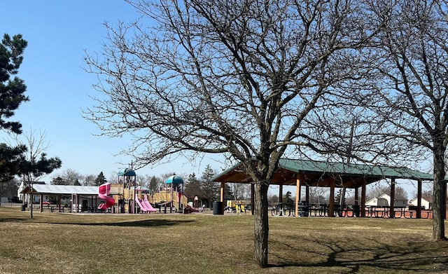 view of community featuring a yard, a gazebo, and playground community