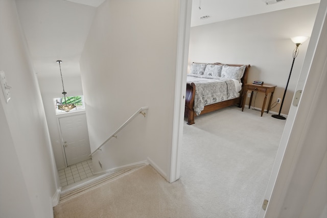 carpeted bedroom with baseboards