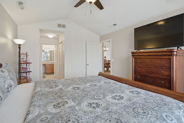 bedroom with visible vents, ensuite bathroom, vaulted ceiling, and ceiling fan