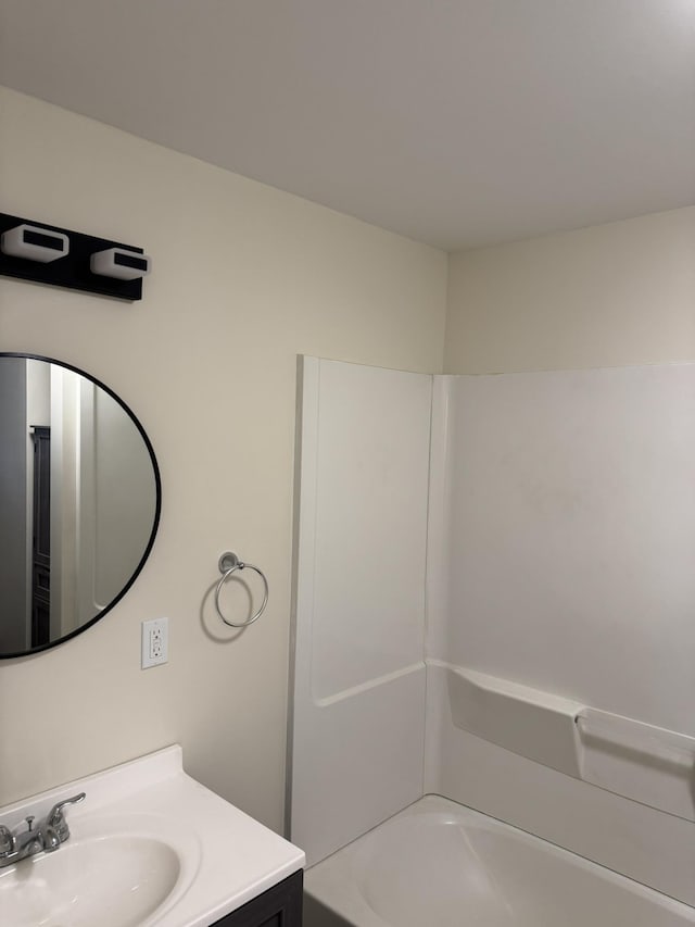 8854 E Pickard Rd, Mount Pleasant, MI 48858 - full bath featuring vanity and shower / tub combination