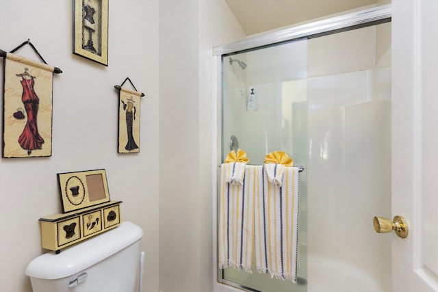 full bathroom featuring an enclosed shower and toilet