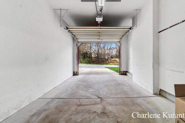 garage with a garage door opener