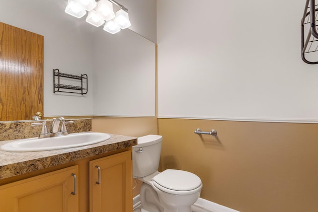 6360 Robison Ln, Saline, MI 48176 - half bathroom with toilet, baseboards, and vanity