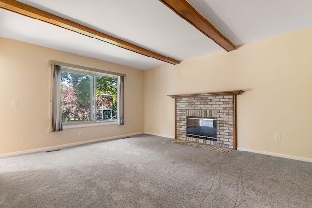 6360 Robison Ln, Saline, MI 48176 - unfurnished living room featuring a fireplace, carpet floors, baseboards, beamed ceiling, and visible vents