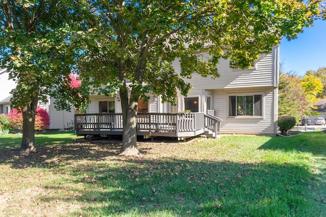 6360 Robison Ln, Saline, MI 48176 - rear view of property with a lawn and a deck