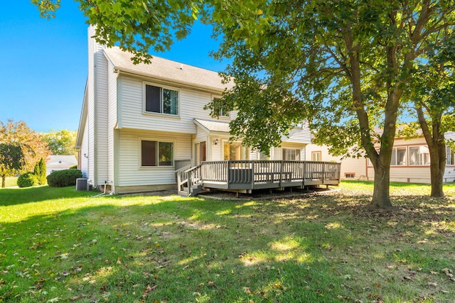 6360 Robison Ln, Saline, MI 48176 - back of property with a lawn, a deck, and a chimney