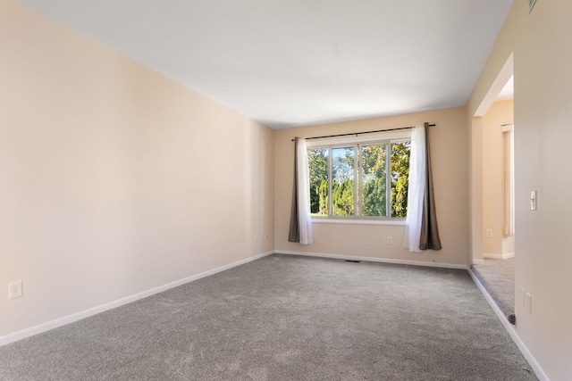 6360 Robison Ln, Saline, MI 48176 - unfurnished room featuring baseboards and carpet flooring