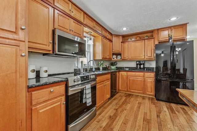 3833 Green Acre Dr, Saint Joseph, MI 49085 - kitchen with open shelves, a sink, black appliances, light wood finished floors, and recessed lighting