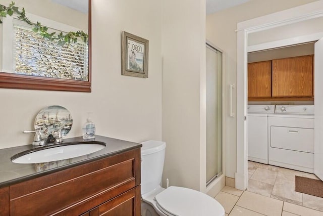 3833 Green Acre Dr, Saint Joseph, MI 49085 - full bath with toilet, washing machine and dryer, a shower stall, and vanity