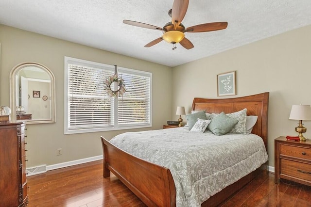 3833 Green Acre Dr, Saint Joseph, MI 49085 - bedroom featuring baseboards, wood-type flooring, a ceiling fan, and visible vents