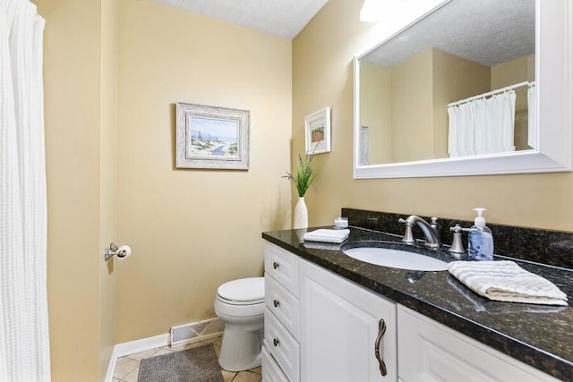 full bathroom with visible vents, tile patterned flooring, vanity, baseboards, and toilet