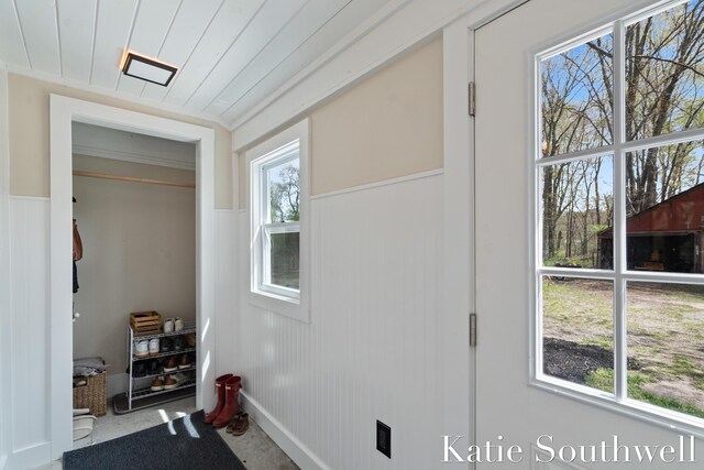entryway with wainscoting