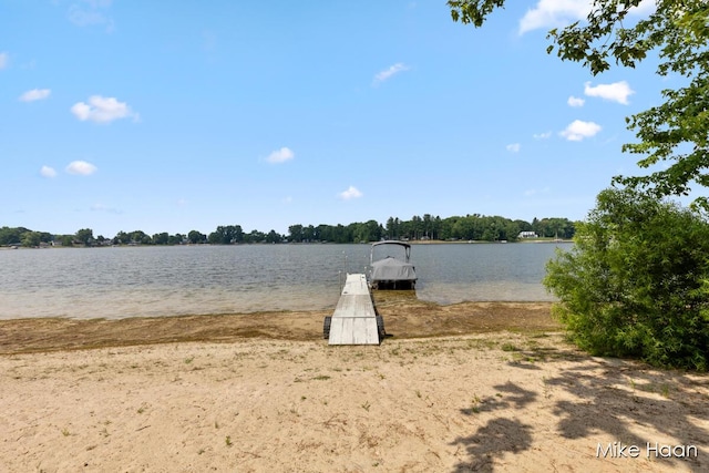 13545 Armitage Dr, Coral, MI 49322 - dock area featuring a water view