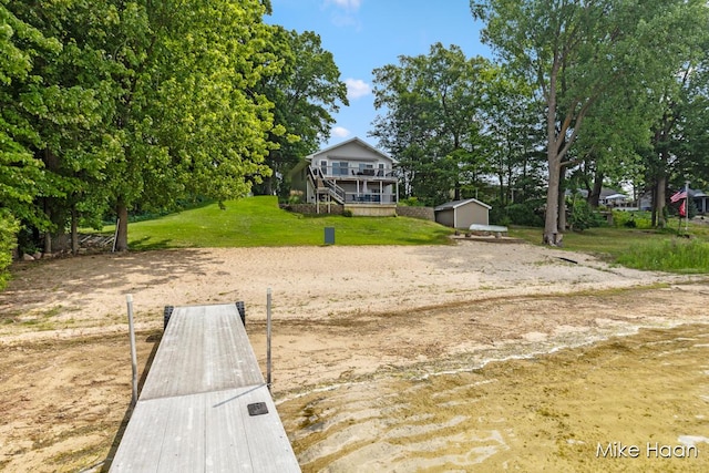 13545 Armitage Dr, Coral, MI 49322 - dock with a yard and stairs