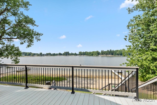 13545 Armitage Dr, Coral, MI 49322 - deck featuring a water view