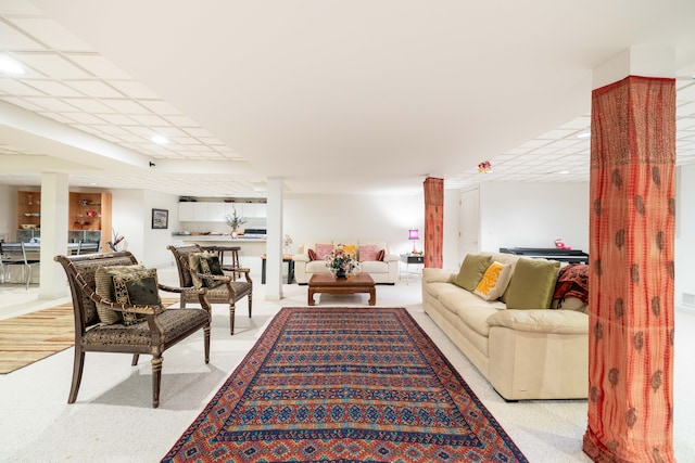 living area featuring recessed lighting and light carpet