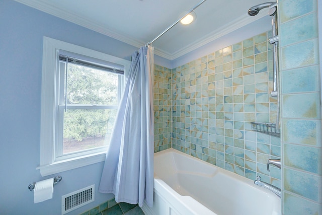 bathroom featuring shower / bath combination with curtain, visible vents, and ornamental molding