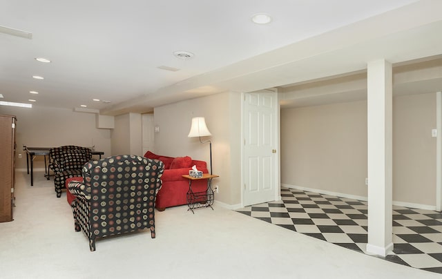 living area featuring recessed lighting, baseboards, and tile patterned floors