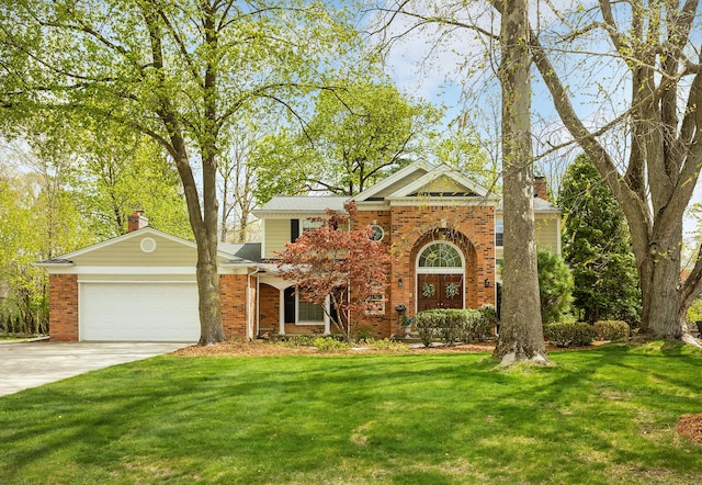 traditional-style house with driveway, a chimney, brick siding, a front lawn, and an attached garage