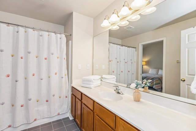 bathroom featuring a shower with curtain, visible vents, tile patterned flooring, and vanity