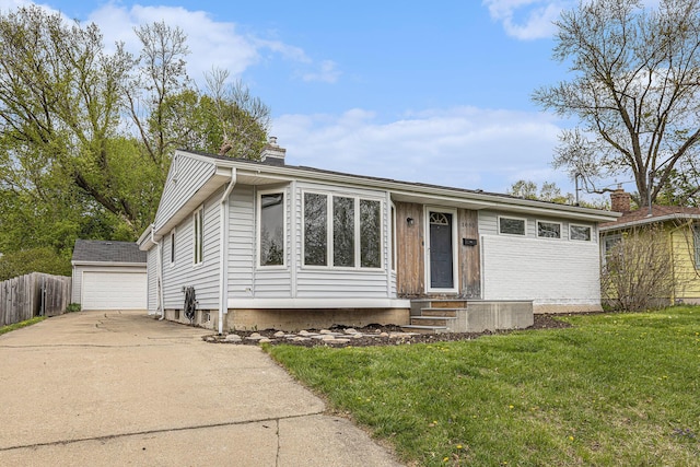ranch-style house with a chimney, a front yard, an outbuilding, fence, and entry steps