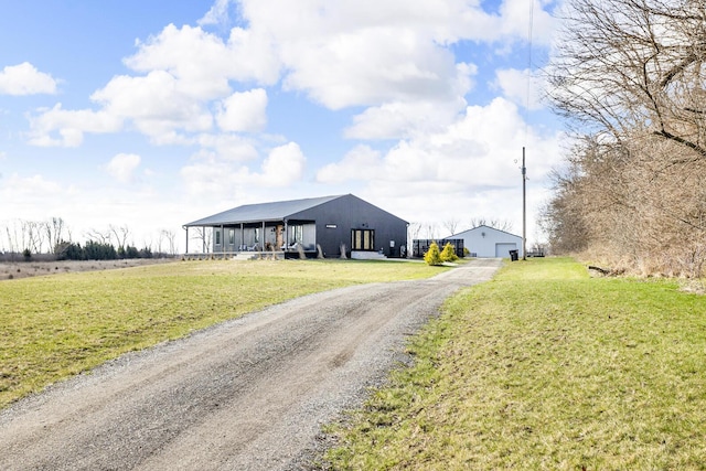 view of street featuring dirt driveway