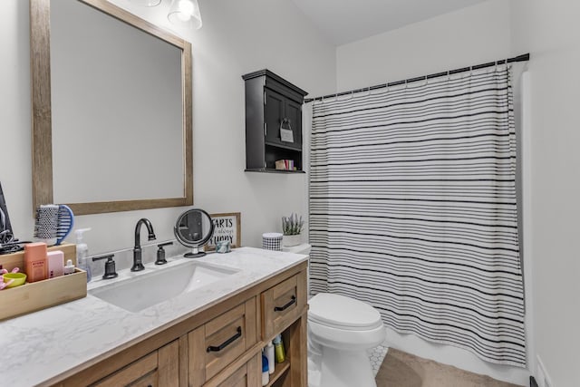 full bath featuring toilet, curtained shower, tile patterned flooring, and vanity