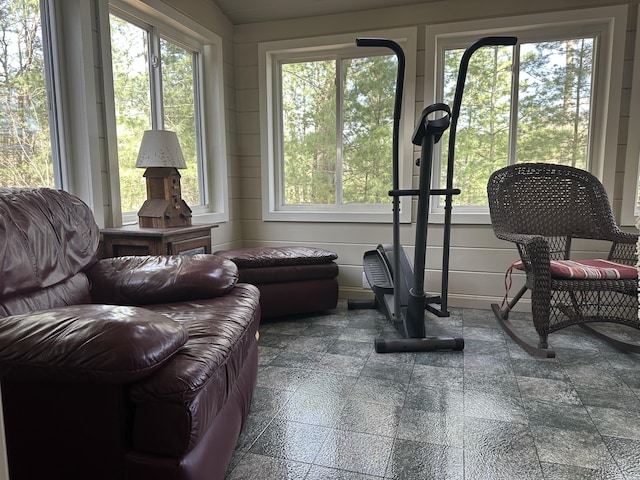 workout area featuring baseboards