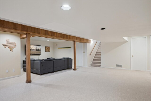 living area with visible vents, carpet flooring, stairs, and recessed lighting