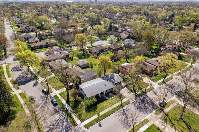birds eye view of property with a residential view