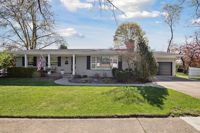 ranch-style home with a front yard, a chimney, brick siding, concrete driveway, and an attached garage