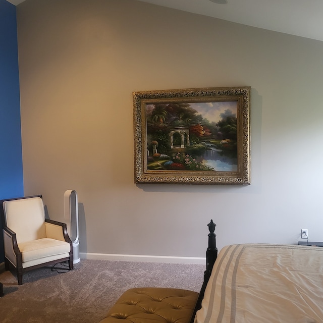 bedroom featuring carpet floors and baseboards