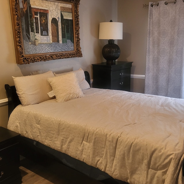 bedroom with baseboards
