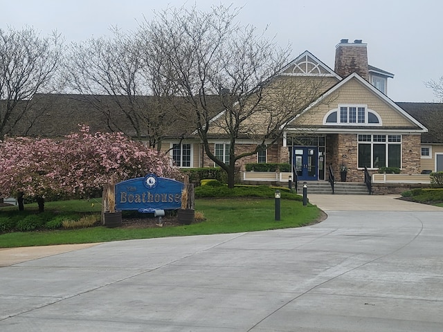 view of building exterior with driveway