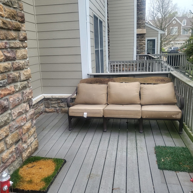 deck featuring outdoor lounge area