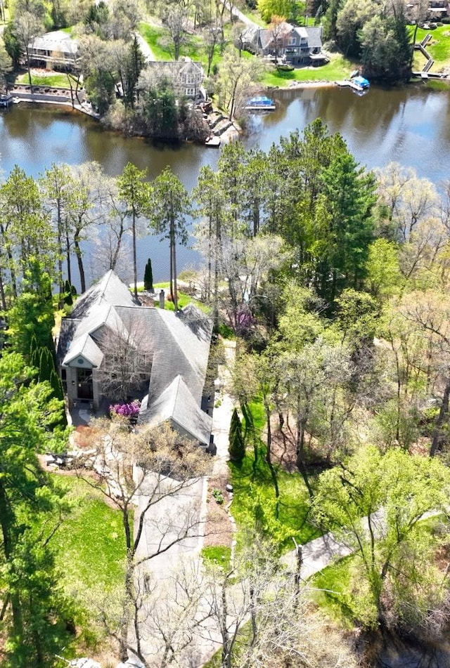 birds eye view of property featuring a water view