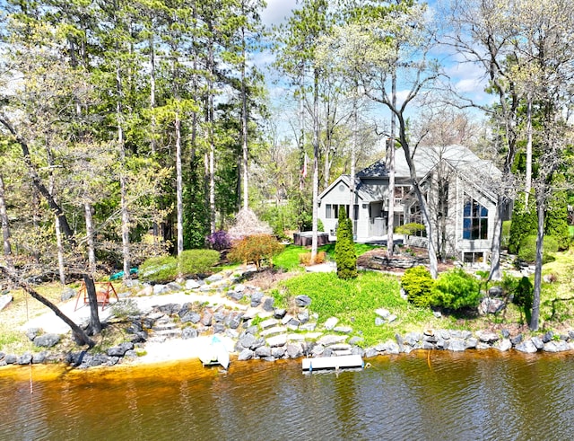 exterior space with a water view
