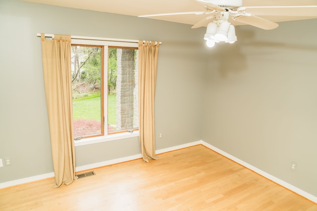 1151 Abseguami Trl, Lake Orion, MI 48362 - unfurnished room featuring light wood-type flooring, baseboards, and a ceiling fan