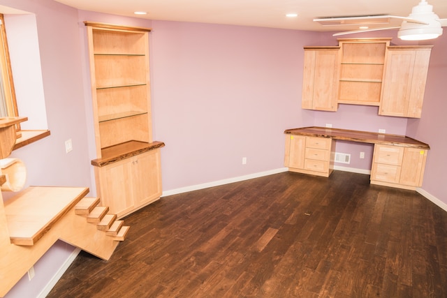 1151 Abseguami Trl, Lake Orion, MI 48362 - unfurnished office with dark wood finished floors, recessed lighting, baseboards, and built in desk