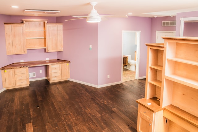 1151 Abseguami Trl, Lake Orion, MI 48362 - unfurnished office with a ceiling fan, dark wood-type flooring, baseboards, recessed lighting, and built in desk