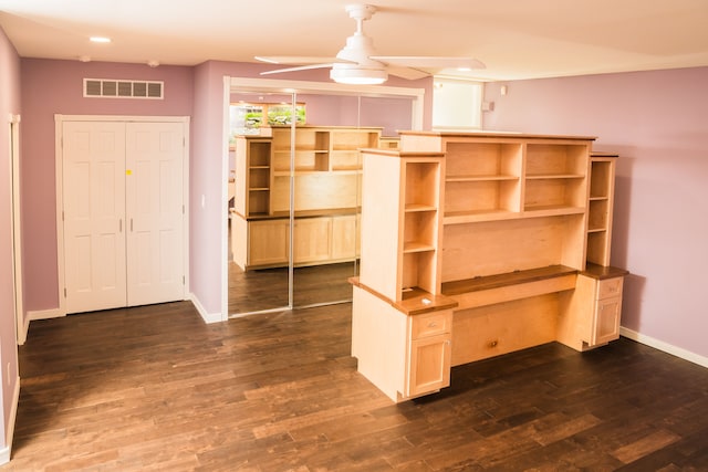 1151 Abseguami Trl, Lake Orion, MI 48362 - unfurnished living room with ceiling fan, baseboards, dark wood finished floors, recessed lighting, and a desk