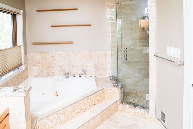 1151 Abseguami Trl, Lake Orion, MI 48362 - full bath with a shower stall, a whirlpool tub, and tile patterned flooring