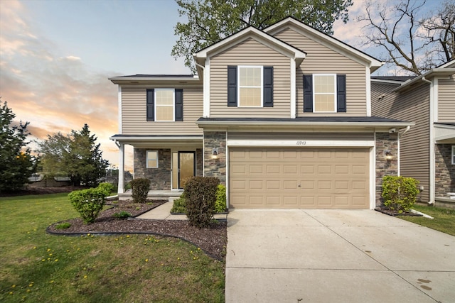 13943 Breakfast Dr, Redford, MI 48239 - traditional-style house featuring stone siding, an attached garage, a front lawn, a porch, and driveway
