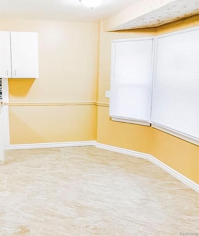 11696 Glastonbury Ave, Detroit, MI 48228 - unfurnished room with baseboards