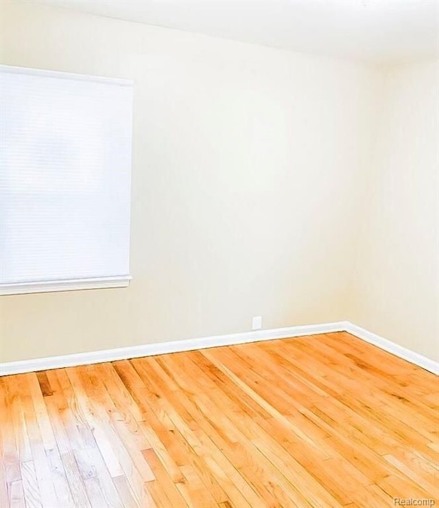 11696 Glastonbury Ave, Detroit, MI 48228 - unfurnished room with wood finished floors and baseboards