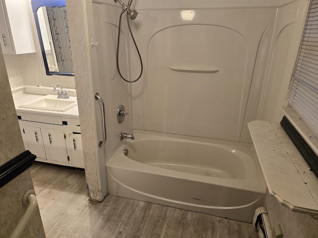 2142 Farnsworth Rd, Lapeer, MI 48446 - full bathroom with wood finished floors, vanity, and  shower combination