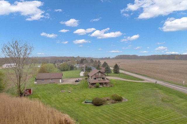 birds eye view of property featuring a rural view