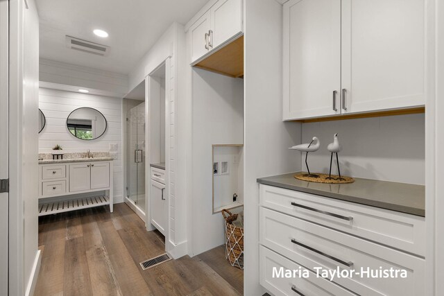 interior space featuring visible vents and a sink