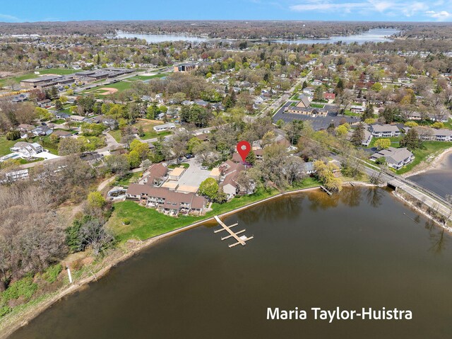 aerial view with a water view and a residential view