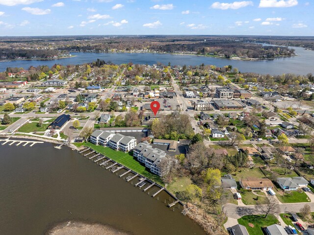 bird's eye view featuring a residential view and a water view
